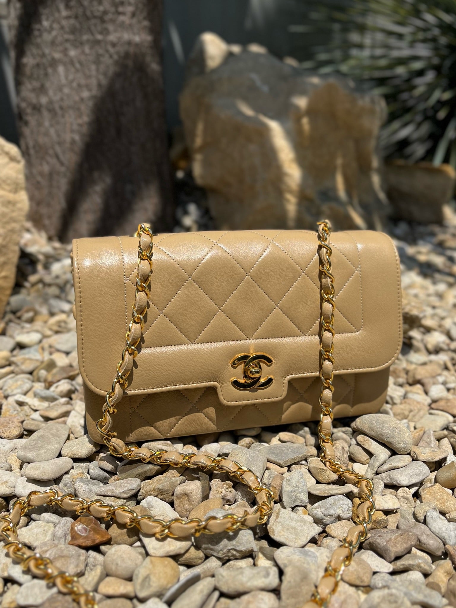 Sold at Auction: Chanel Quilted Tan Leather Bag