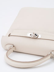 Hermès Kelly 25 Retourne Handbag, W stamp: 2024, Togo leather, Craie, Silver hardware
