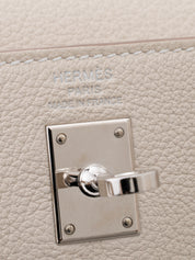 Hermès Kelly 25 Retourne Handbag, W stamp: 2024, Togo leather, Craie, Silver hardware