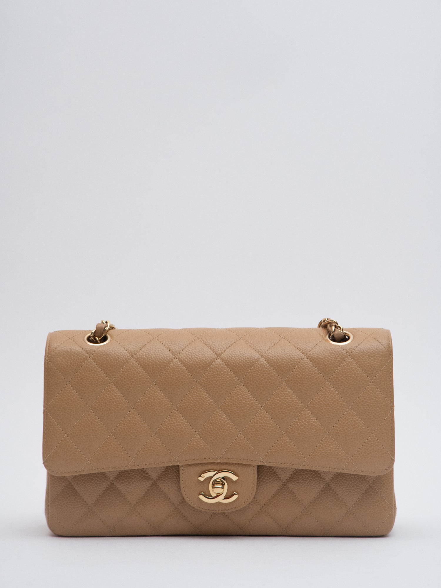 Chanel medium best sale flap beige caviar